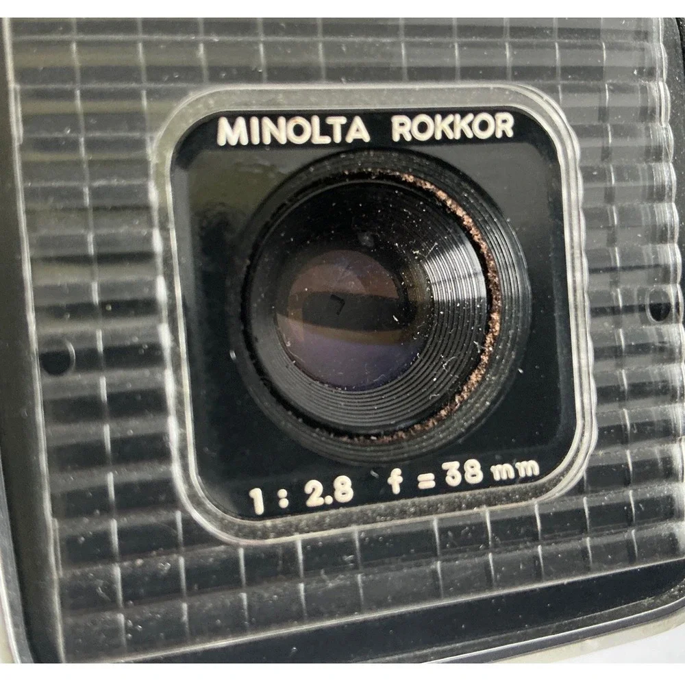 Minolta Vintage Autopak 500 Film Camera Rokkor 38mm f/2.8 Lens Silver Black Retr